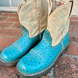 Barn boot, mud boot, roper boot, cowboy boot.